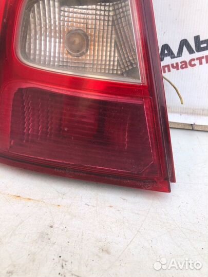 Фонарь задний левый Renault Logan седан 1.4