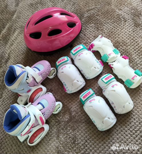 Роликовые коньки, защита и шлем