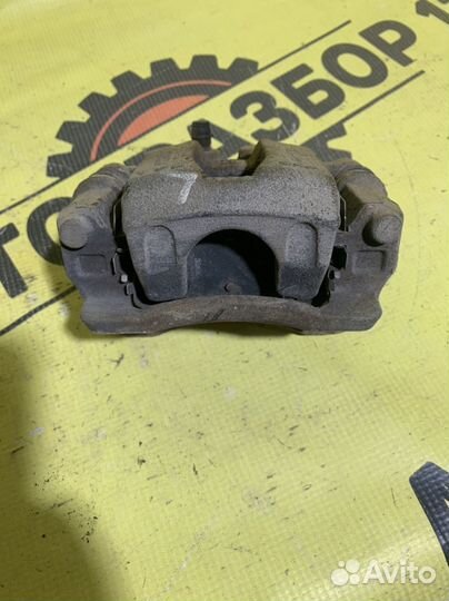 Суппорт задний левый Kia Sportage 4 QL