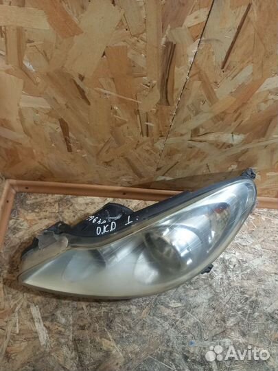 Фара Левая Опель Корса Д 13186381EF