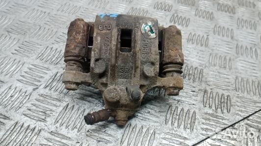 Суппорт тормозной задний левый KIA sportage 3 (7NK