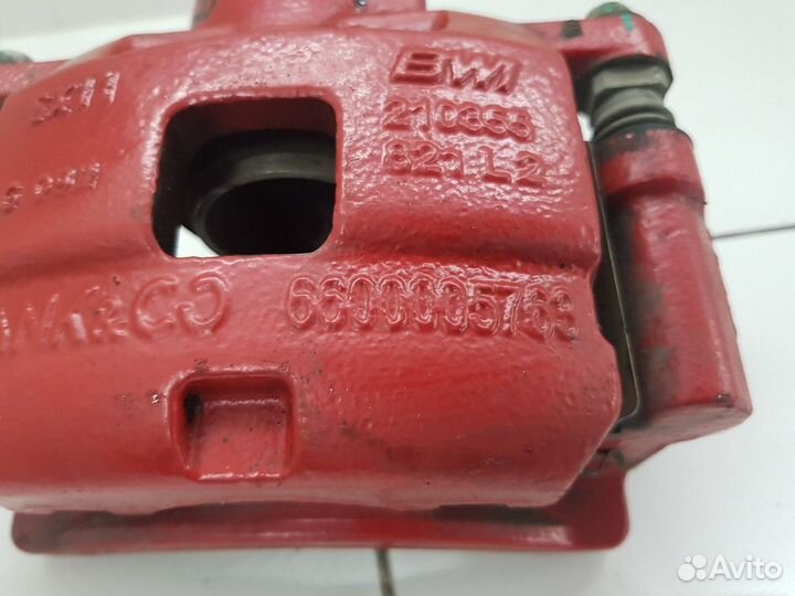 Суппорт передний левый (Geely Coolray)