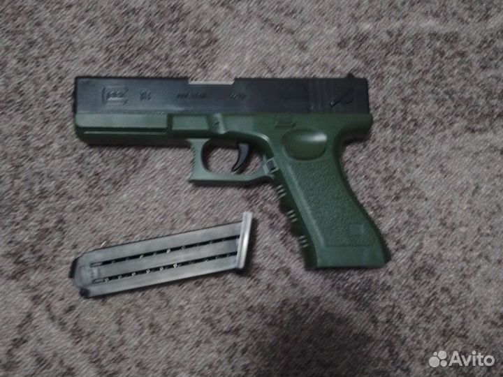 Пистолет glock 18 игрушечный с выбросом гильз
