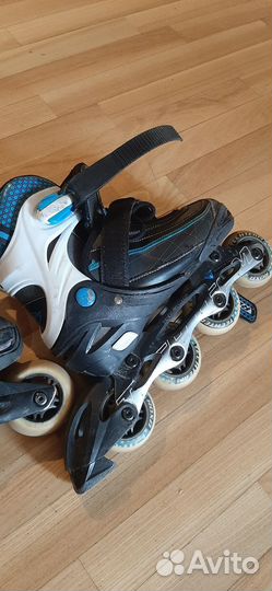 Роликовые коньки