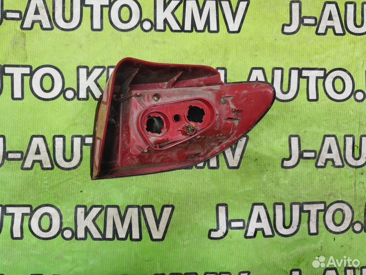 Фонарь задний Mazda Demio
