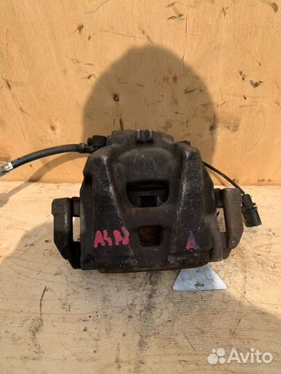 Тормозной суппорт Ауди А4 В8 передний левый