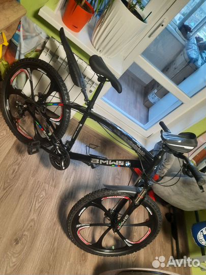 Велосипед на литых дисках bmw 26' 21 скорость