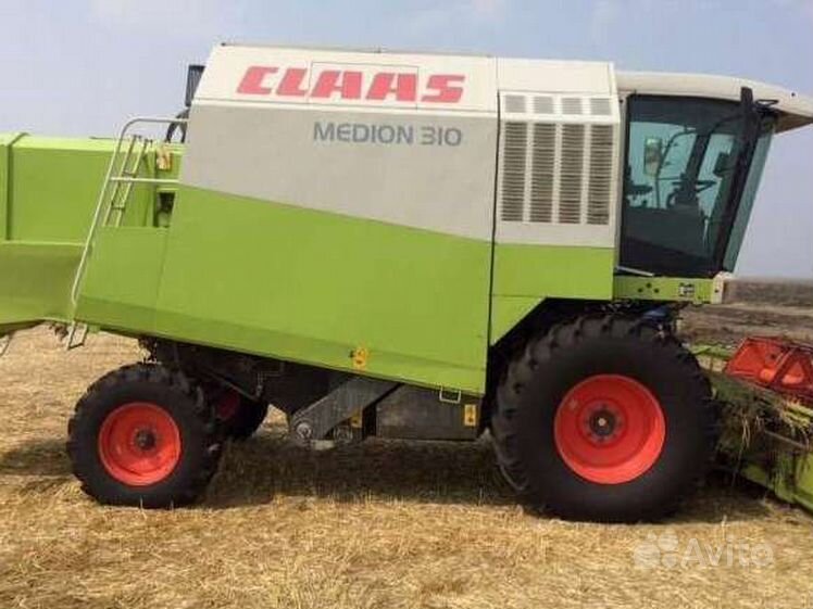 Claas medion 340. Медион 310. Класс медиум 310 комбайн. Балансирующий диск class medion 310. Class 310 комбайн.