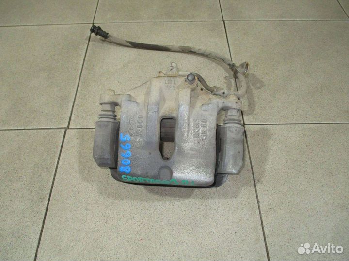 Суппорт передний левый Kia Sportage 3 (SL)