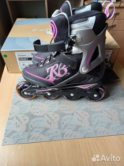 Роликовые коньки