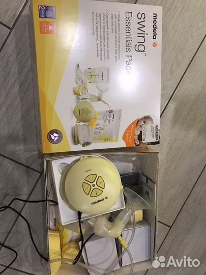 Молокоотсос medela электрический