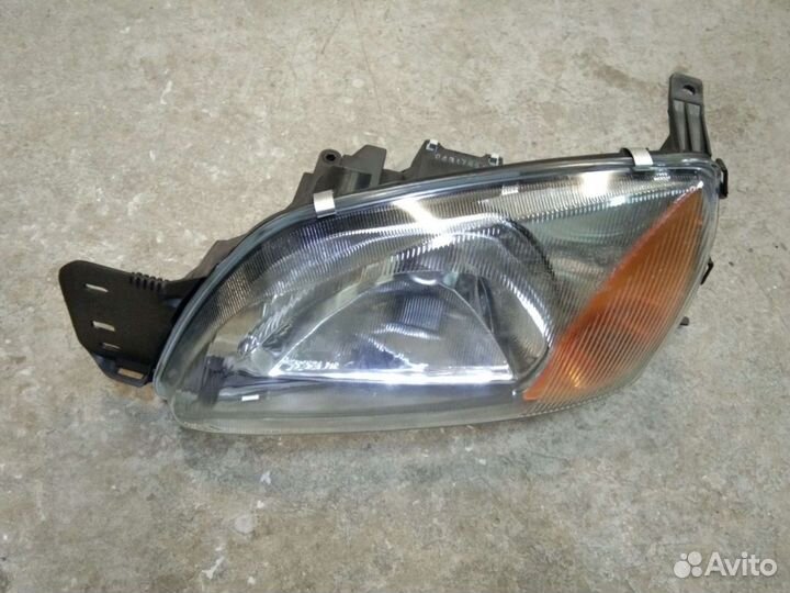 Фара левая Форд Фиеста MK 4 рестайлинг
