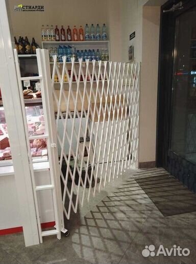Решетка раздвижная на проем в магазин