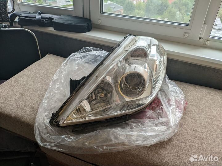 Фара левая ксенон Nissan Tiida