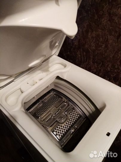 Стиральная машина с вертикальной загрузкой