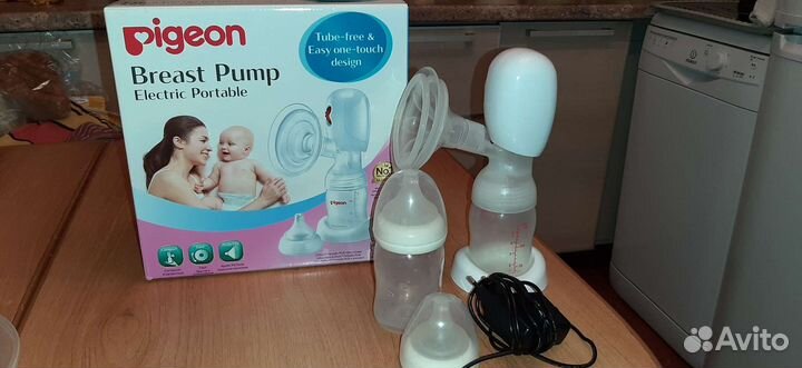 Молокоотсос электрический бу