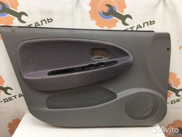 Обшивка двери передняя левая Kia Rio 1