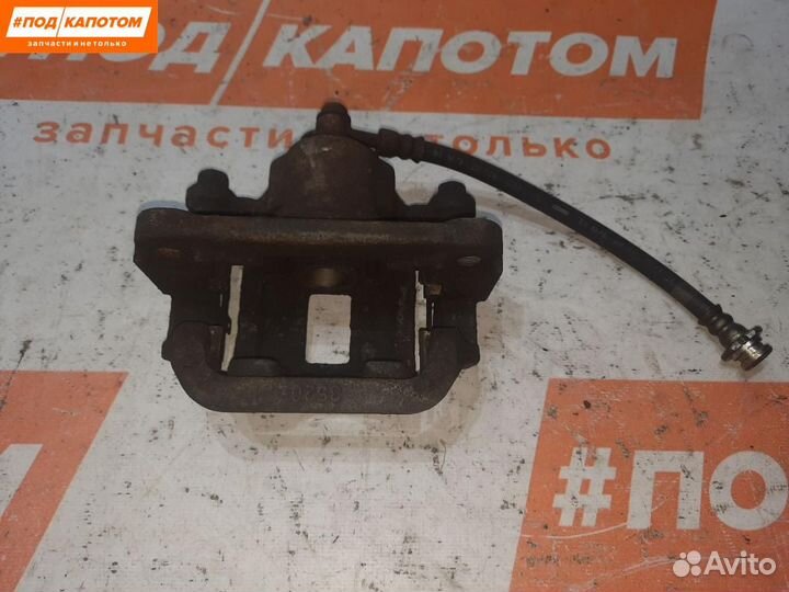 Суппорт тормозной задний левый Nissan X-Trail