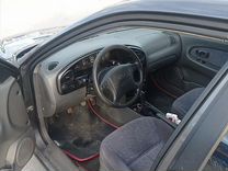 Kia Spectra 1.6 MT, 2006, 250 000 км, с пробегом, цена 210 000 руб.