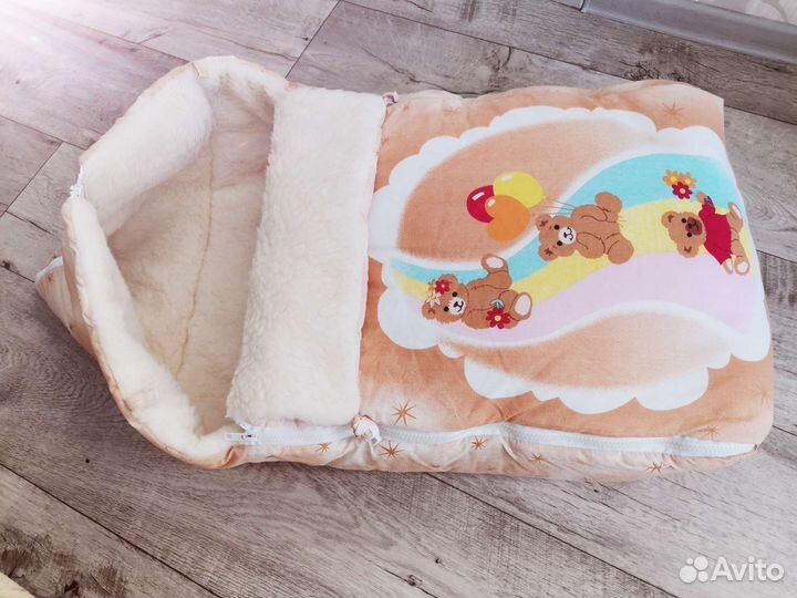 Зимний конверт в коляскуна овчине