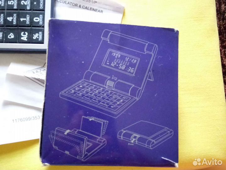 Часы будильник с калькулятором