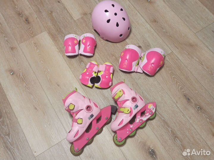 Роликовые коньки