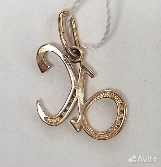 Золотая подвеска с камнем
