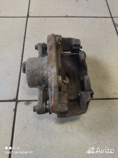 Суппорт тормозной передний правый Volkswagen Polo