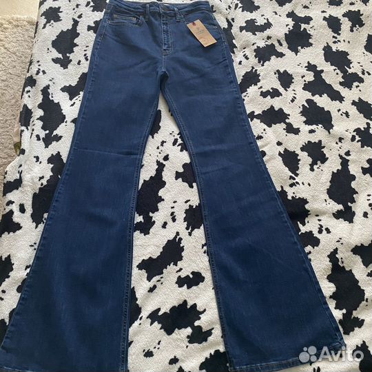 Джинсы клеш женские