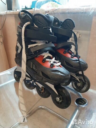 Роликовые коньки