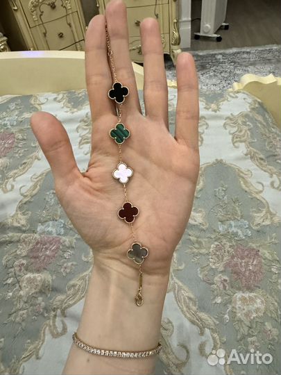 Золотой браслет и кольцо van cliff