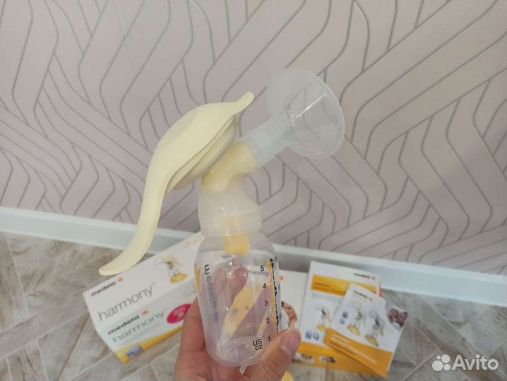 Молокоотсос medela ручной