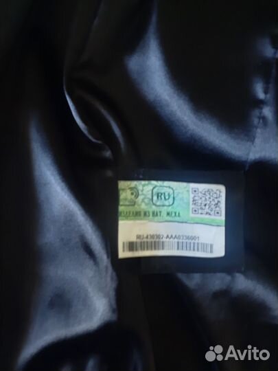 Шуба из стриженной нутрии с отделкой из каракуля