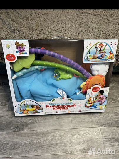 Развивающий коврик новый