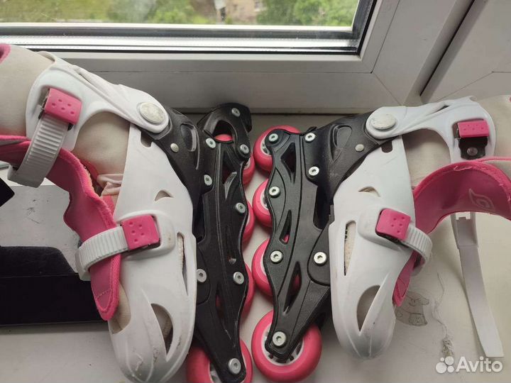 Роликовые коньки