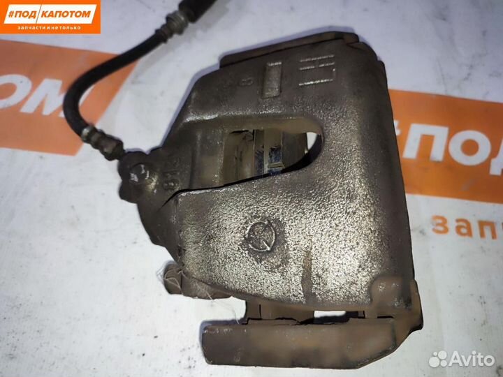 Суппорт тормозной передний левый Mazda 3 BK рест