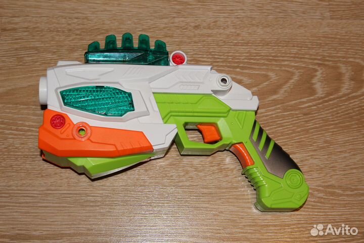 Динозавр - пистолет трансформер музыкальный