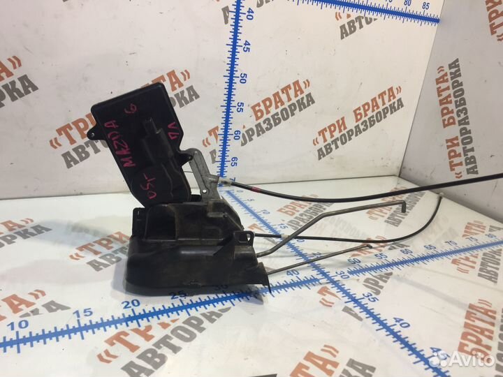 Мазда 6 Замок передней двери Лев