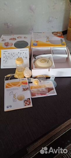 Молокоотсос medela электрический