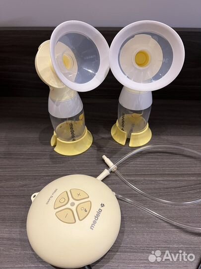 Молокоотсос medela swing maxi flex