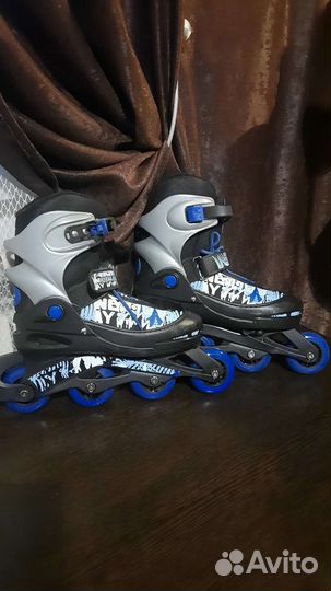 Роликовые коньки