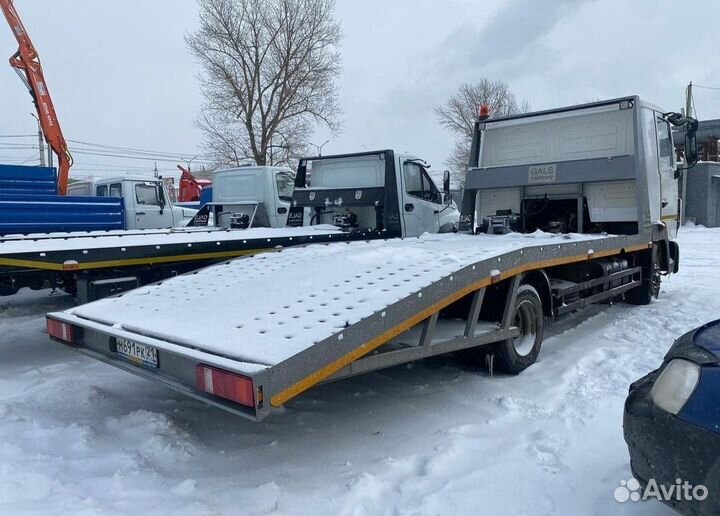 Эвакуаторная платформа ломаного типа