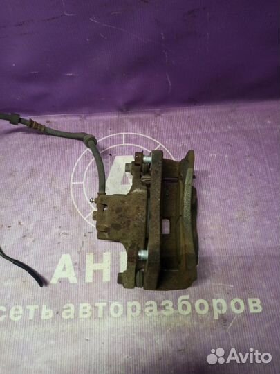 Суппорт тормозной передний правый Mitsubishi