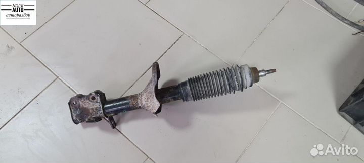 Амортизатор задний левый Kia Spectra 2-й рест. LD