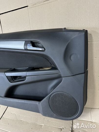 Обшивка двери передняя левая Opel Astra H GTC