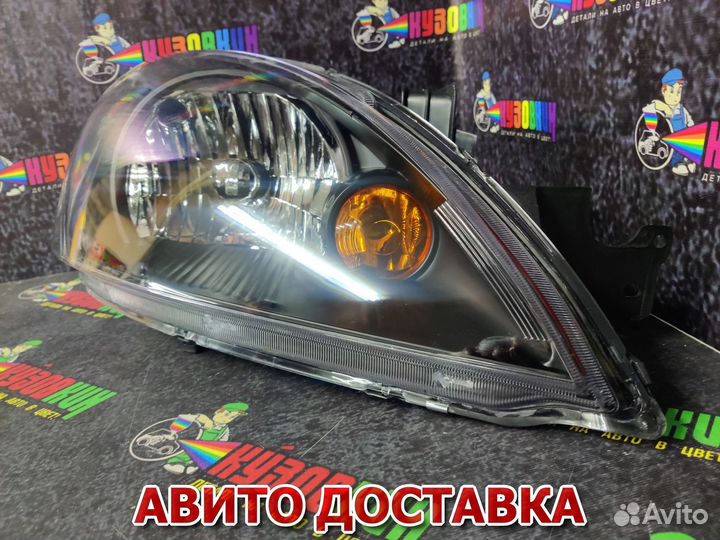 Фара mitsubishi lancer 03-07 правая черна Евросвет