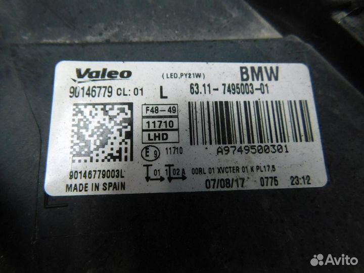 Фара левая BMW X1