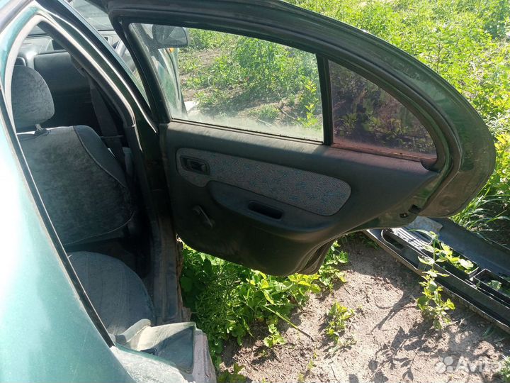 Стеклоподъемник задний правый Nissan Almera N15