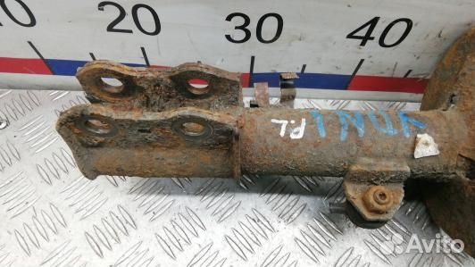 Стойка передняя левая toyota corolla E12 (JDN01K50