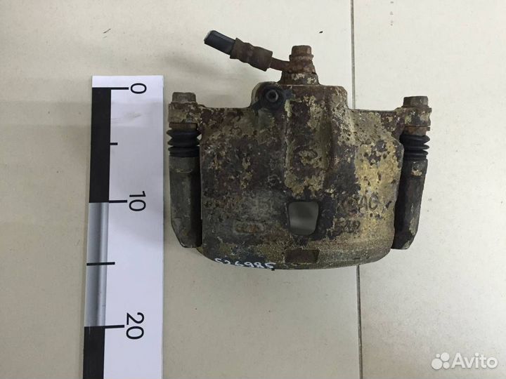 Суппорт передний правый Nissan Almera Classic B10